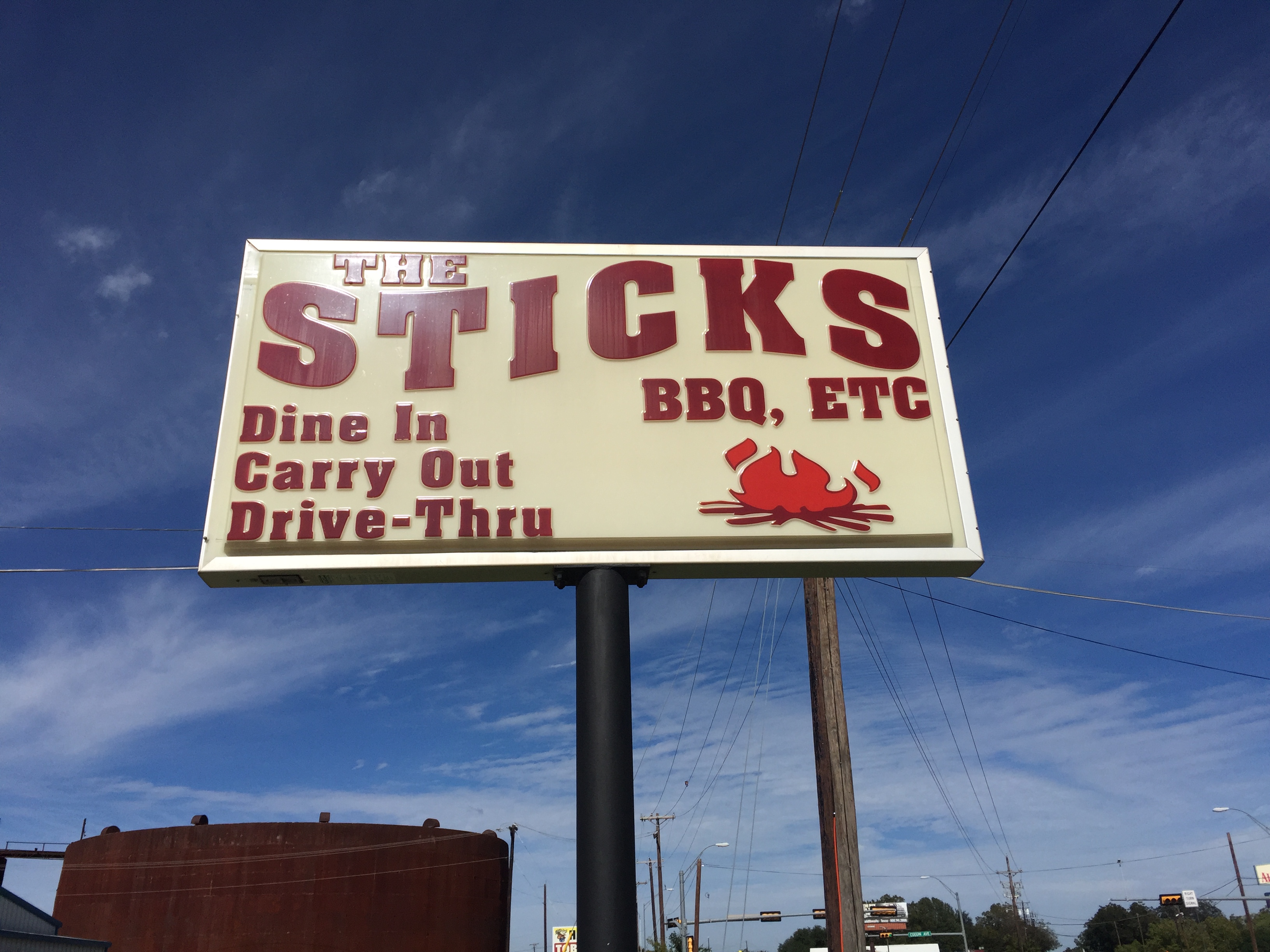The Sticks BBQ roadside sign — Dine In, Carry Out, Drive-Thru, Brownwood TX