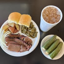 The Sticks BBQ — full plate with brisket, green beans, corn, dinner rolls, Brownwood TX